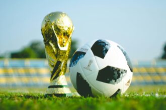 https://unsplash.com/photos/gold-colored-trophy-and-soccerball-cjYQBSKDSII